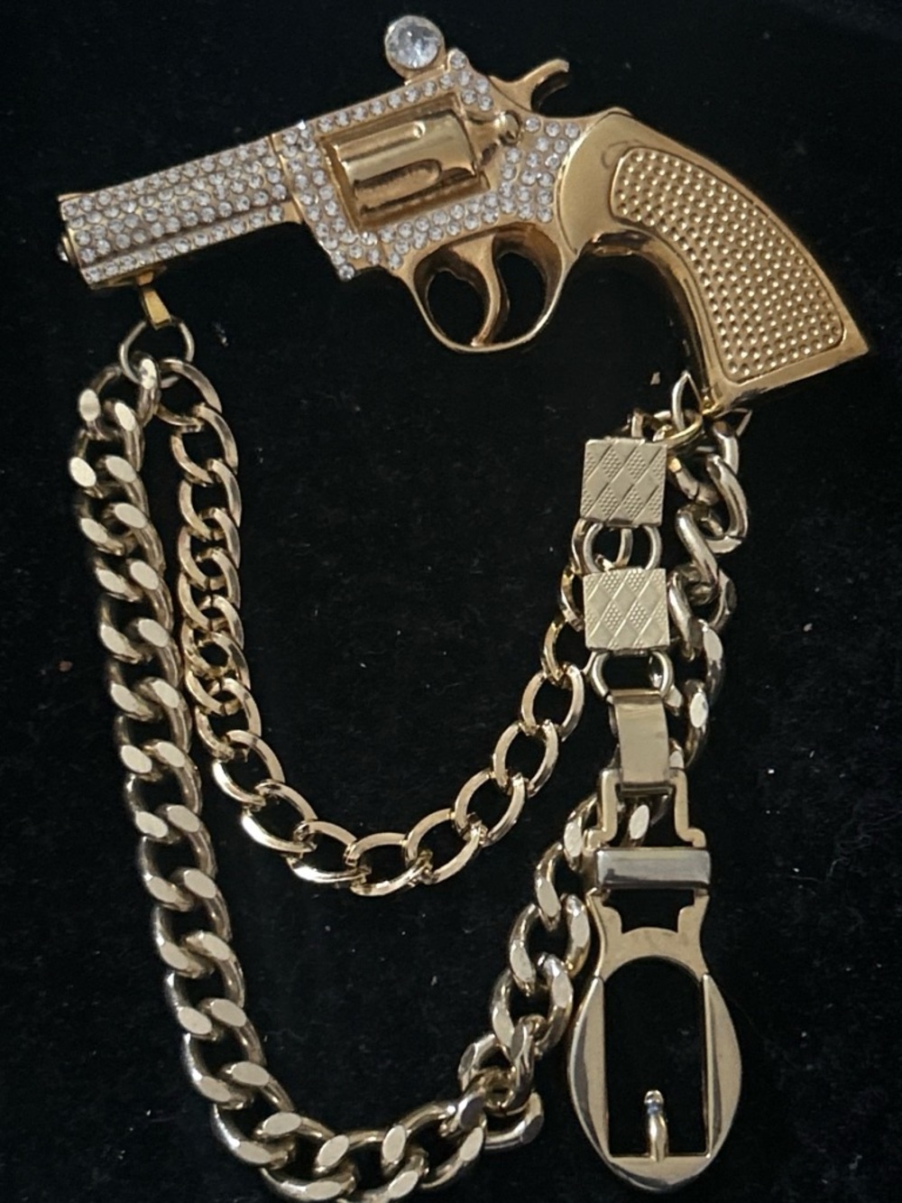 Gold Pistol Brooch with Chain Accent - Women's Luxury Jewelry SEND OFFERS